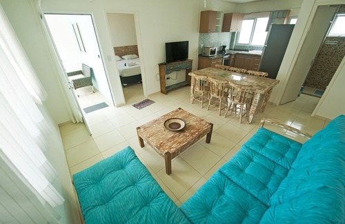 Pilar Appartement | Manga Verde Beach 04: Vue sur la piscine et la plage H