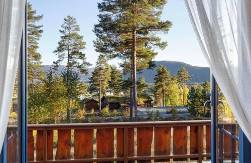Vradal Maison | Marit's Hytte is a typical Norwegian holiday home, suitable for 6 to 8 people. Enjoy the fantastic view from the spacious veranda of this house.