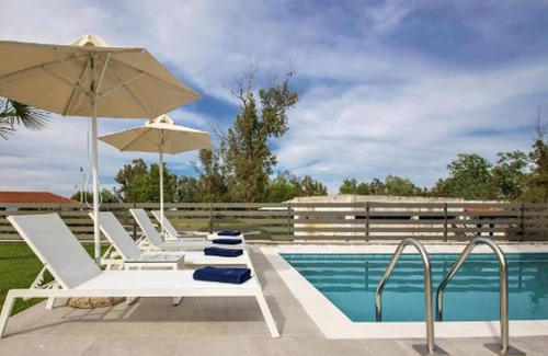 Pefkochori Villa | Marvellous Halkidiki Villa | Villa Amroth | 3 Bedrooms | Spacious Furnished Sun Terrace | Private Outdoor Pool and Hot Tub | BBQ Facilities and Shaded Outdoor Dining Area | Pefkohori