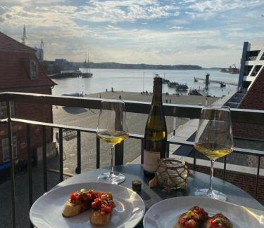 Wismar Appartement | Meerblick, Balkon und private Sauna im historischen Getreidespeicher