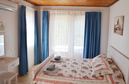 Ortaca Villa | Melisa Villa avec vue sur la mer piscine privée et jardin toutes les chambres sont climatisées