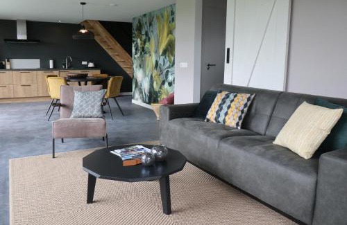 Baexem Maison | Met de Kippen op Stok - Vakantiehuisjes