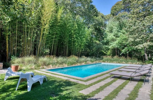 Silver Beach Maison | Mid-Century Gem with Pool, Fireplace and Steps to Private Beach.