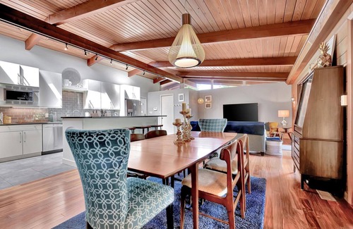 Champaign Maison | Mid-Century Modern House with Hot Tub Near Country Club