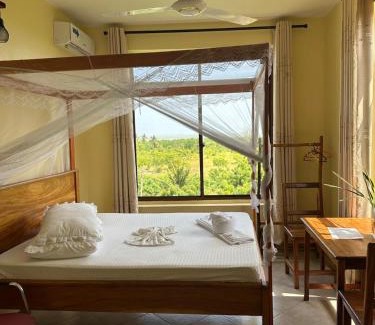 Bagamoyo Lit Et Petit-Déjeuner | Mikoko Beach & Cottages