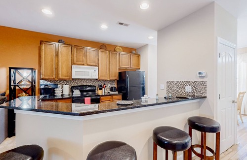 Millville Maison | Millville by the Sea three-story home with resort amenities & screened patio