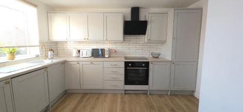 Milton Keynes Appartement | Milton Keynes 3BR modern Home, Sleeps 5, Families, Free Parking