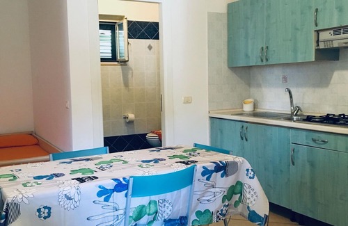 Defensola Lit Et Petit-Déjeuner | MIMOSA C Villa trois pièces pour 6 personnes 2 chambres et salle de séjour avec 2 lits