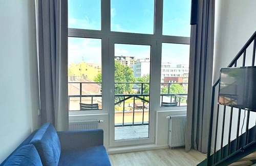 Liberty Avenue Appartement | Mini Loft 1 BD Apt by Hostlovers