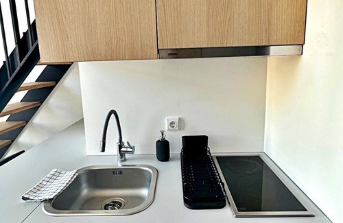 Liberty Avenue Appartement | Mini Loft 1 BD Apt by Hostlovers