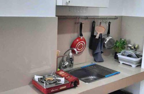 Tangerang Appartement | Minimalist room at The Nest Apartment by Popobella Near Puri Indah West Jakarta