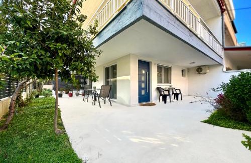 Olymbiaki Akti Maison | Minimalist Seaside Apartment with Private Patio and Parking - Blue Zone Homes