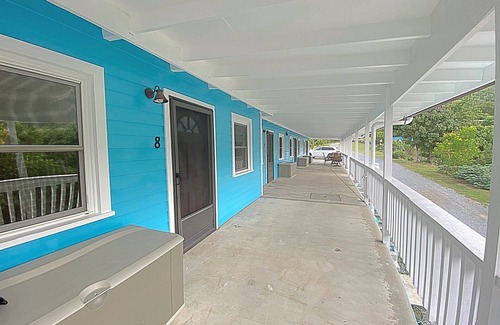 Cane Bay Cottage | Minutes Walk to Cane Bay Beach- Porch Mountain Views, Sea from the backyard