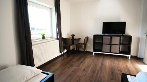 Celle Appartement | Mivano-Apartments WiFi Küche NETFLIX