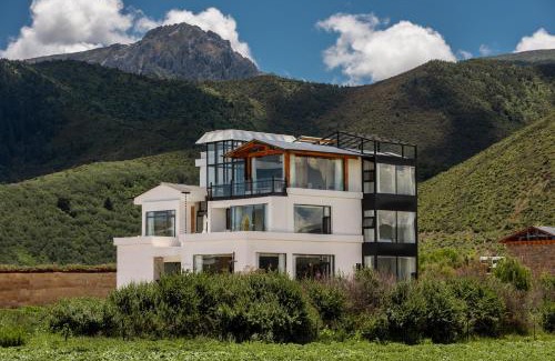 Shangri-La Hôtel | Miyinxianye Snow Mountain Makino Migratory Bird Viewing B&B Napa Sea Scenic Area Branch
