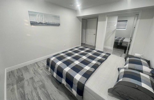 Woodslee Maison | Modern 1BR Basement Retreat