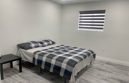 Woodslee Maison | Modern 1BR Basement Retreat