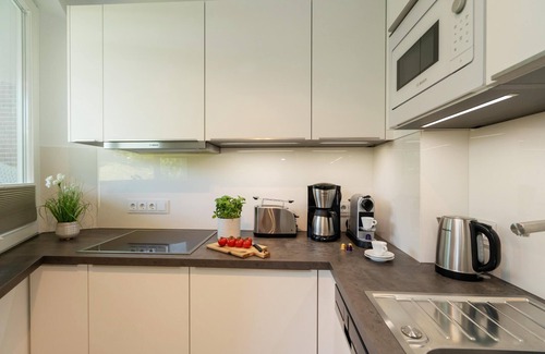 Westerland Appartement | Modern 2-room apartment with terrace, parking space, WLAN. Pets allowed.