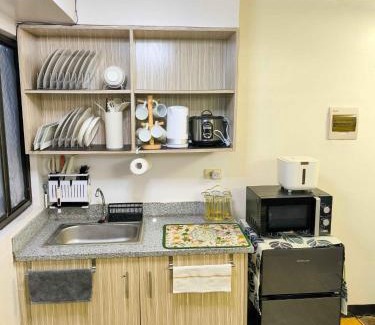 Imus Appartement | Modern 2BR Condo with Terrace,Netflix,Pool,& WiFi