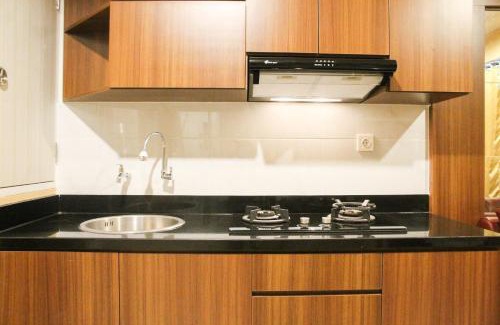 Bekasi Barat Appartement | Modern 2BR Grand kamala Lagoon Apartment By Travelio