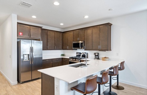 Goodyear Maison | Modern 3BR/2BA home in Goodyear with a community pool, pickleball courts, and EV charger! Less than a mile from Goodyear baseball stadium and close to other major venues, shopping, and golf courses!