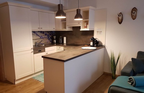 Flattach Appartement | Appartement moderne de 75 m² pour 2 à 5 personnes avec cheminée et belle vue sur la montagne!
