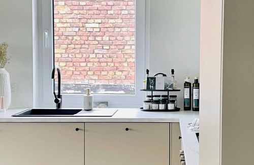 Lage Appartement | Modern and bright apartment with balcony and carport