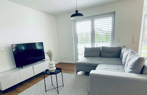 Lage Appartement | Modern and bright apartment with balcony and carport
