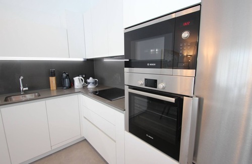 San Eugenio Appartement | Appartement moderne, emplacement central, à 350 m de la plage, piscine communautaire
