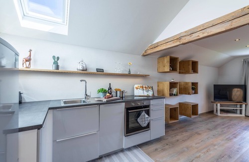 Taching a.See Appartement | Appartement moderne "Linde" avec vue sur le lac, vue sur les montagnes, jardin et terrasse