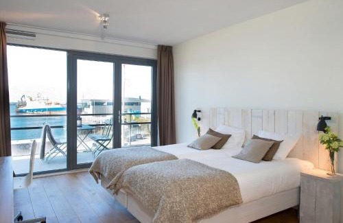 Vissershaven Appartement | Modern apartment in the harbor of Schevening