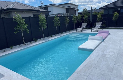 Papamoa Beach Maison | Modern Beachside Oasis with Private Heated Pool - Pet Friendly!
