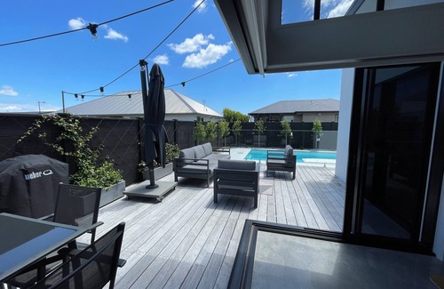 Papamoa Beach Maison | Modern Beachside Oasis with Private Heated Pool - Pet Friendly!