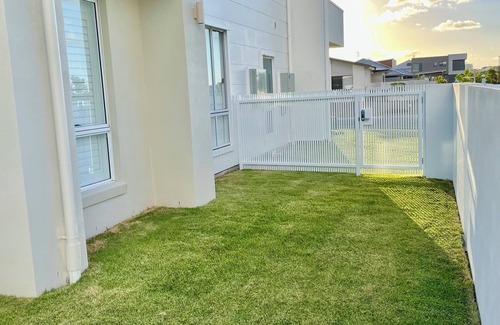 Pelican Waters Maison | Modern Boho Retreat with Pool, Yard & Beaches Just Minutes Away