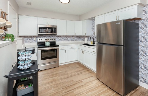 Des Moines Maison | Modern Boho Townhome w/Hidden Reading Nook Near Downtown Des Moines!