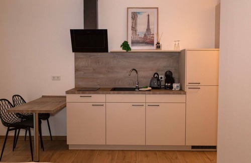 Jollenbeck Copropriété | Modern cozy purple apartment
