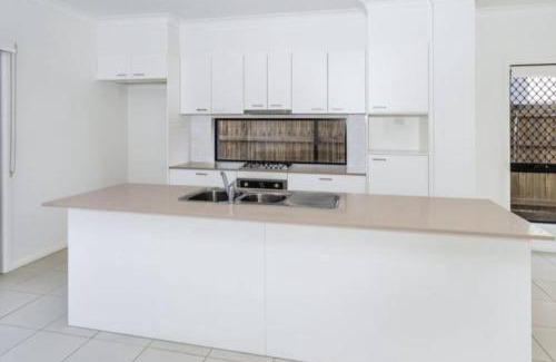 Mango Hill Maison | Modern Elegance Near Lakes Train Parks and Beaches