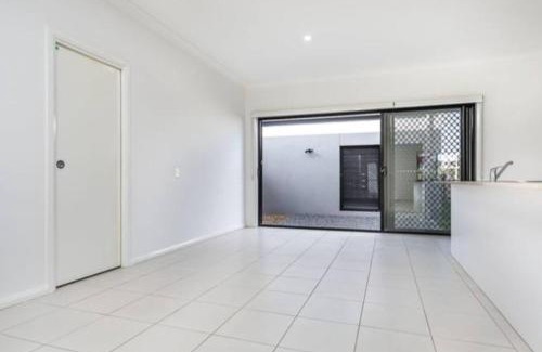 Mango Hill Maison | Modern Elegance Near Lakes Train Parks and Beaches
