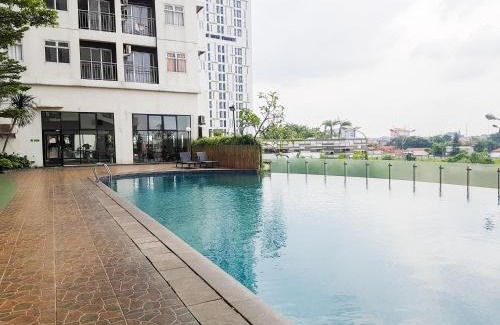 Serpong Appartement | Modern Look and Comfortable 2BR Serpong Greenview Apartment By Travellio