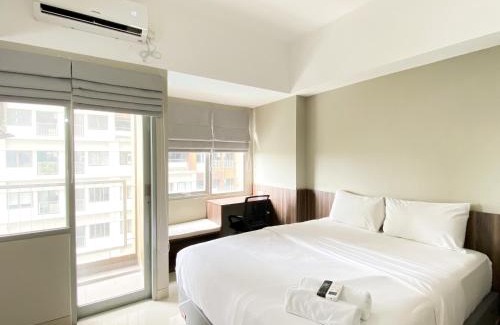 Duren Sawit Appartement | Modern Look and Tidy Studio Gateway Park LRT City Jatibening Apartment By Travelio