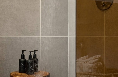 East Bank Hôtel | Modern Luxury Meets Southern Charm: Convenient City View Unit