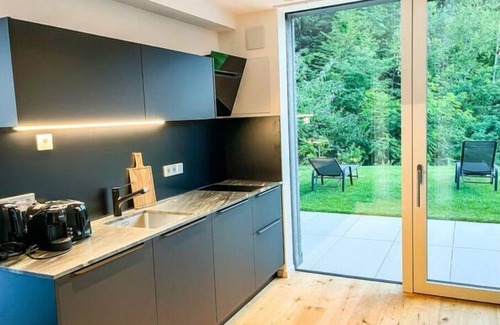 Sant'Andrea in Monte Appartement | modern, luxury, private entrance, garden, terrace, and stunning mountain views.
