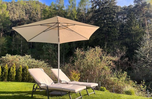 Sant'Andrea in Monte Appartement | modern, luxury, private entrance, garden, terrace, and stunning mountain views.