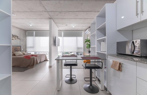 Curridabat Appartement | Modern Oasis iFreses, 18th floor! AC, TV and Pool