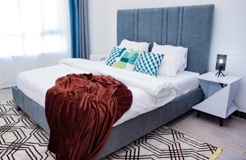 Central Province Appartement | modern serenity suites apartments with swimming pool,modern equipped gym,private parking space, children playing ground, proximity to major shopping malls and unbeatable city views