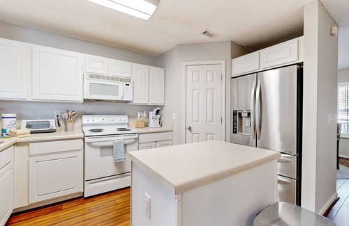 Nashboro Village Maison | Modern townhome with on-site golf & pool - water views, W/D, & central AC