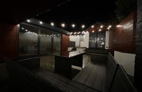 Roughton Maison | Modern upside down property with hot tub