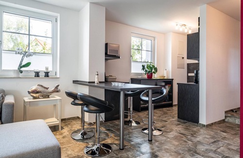 Graal Mueritz Appartement | Modern vacation apartment with fireplace close to the beach