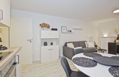 Lietzow Appartement | Modern vacation apartment with fireplace, balcony - Ferienresidenz Zwei Bodden FeWo111 -