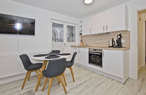 Lietzow Appartement | Modern vacation apartment with fireplace, balcony - Ferienresidenz Zwei Bodden FeWo111 -
